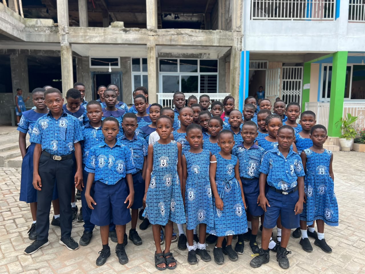 Kids College & Premier learners gathered in the school courtyard
